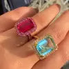 8.4ct Emerald Cut Aquamarine Pink Halo Cocktail Ring