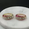 Gradient Size Ruby and White Sapphire Wedding Band