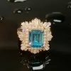 3.8ct Emerald Cut Aquamarine Vintage Halo Ring