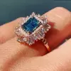3.8ct Emerald Cut Aquamarine Vintage Halo Ring