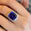Halo Emerald Cut Sapphire Engagement Ring