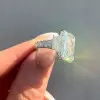 8.4ct Radiant Cut White Sapphire Three Stone Engagement Ring
