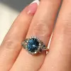5ct Oval Cut Blue Sapphire Cluster Halo Ring