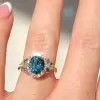 5ct Oval Cut Blue Sapphire Cluster Halo Ring