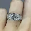 9.3ct Oval Cut White Sapphire Paved Engagement Ring