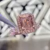 6ct Emerald Cut Peach Pink Sapphire Halo Engagement Ring