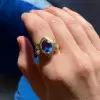 Oval Cut Tanzanite Blue Sapphire Fluid Edge Cocktail Ring