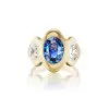 Oval Cut Tanzanite Blue Sapphire Fluid Edge Cocktail Ring