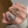 Round Cut White Sapphire Modern Wave Ring