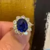 5ct Oval Cut Tanzanite Blue Sapphire Daisy Engagement Ring