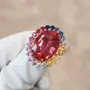 13ct Oval Cut Ruby Rainbow Halo Cocktail Ring