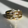 Scattered White Sapphire Modern Wedding Band