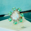 5ct Pear-shaped Opal Emerald Halo Cocktail Ring