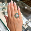 5ct Pear-shaped Opal Emerald Halo Cocktail Ring