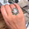 5ct Pear-shaped Opal Emerald Halo Cocktail Ring