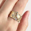 Round Cut White Sapphire Scattered Asymmetric Cigar Band