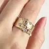Round Cut White Sapphire Scattered Asymmetric Cigar Band