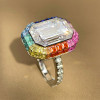 8.4ct Emerald Cut White Sapphire Rainbow Halo Cocktail Ring