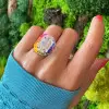 8.4ct Emerald Cut White Sapphire Rainbow Halo Cocktail Ring