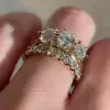 7ctw Round Cut Gold Tone Three Stone Wedding Ring Set