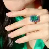 5.3ct Emerald Cut Emerald Halo Cocktail Ring