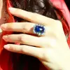 5.3ct Emerald Cut Emerald Halo Cocktail Ring