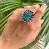 8ct Cushion-shaped Sugarloaf Cut Emreald Halo Cocktail Ring