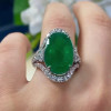Halo Oval Cut Emerald Ring