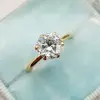 Simple Round Cut White Sapphire Solitaire Ring