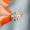 Simple Round Cut White Sapphire Solitaire Ring