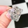 Radiant Cut White Sapphire Three Stone Engagement Ring