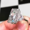 Radiant Cut White Sapphire Three Stone Engagement Ring