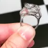 Radiant Cut White Sapphire Three Stone Engagement Ring