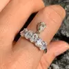 3ctw Oval and Pear Cut Drop Wedding Band