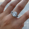 Vintage Leaf & Vine Art Deco Halo Oval Cut Bridal Set