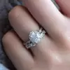 Vintage Leaf & Vine Art Deco Halo Oval Cut Bridal Set