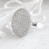 Round Cut Twilight Oval-shaped Paved Cocktail Ring