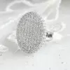 Round Cut Twilight Oval-shaped Paved Cocktail Ring