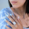 Round Cut Twilight Oval-shaped Paved Cocktail Ring