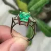 Classic Three-Stone Emerald Cut Engagement Ring
