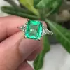 Classic Three-Stone Emerald Cut Engagement Ring