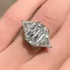 7ct Three-Stone Emerald Cut White Sapphire Engagement Ring