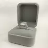 2.5ct Emerald Cut White Sapphire Three-Stone Engagement Ring