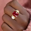6ctw Cushion Cut Ruby Three-Stone Engagement Ring