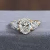 2.5CT Oval Cut Three-Stone White Sapphire Yellow Gold Ring
