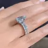 Pear Cut 3 Carat Encrusted Engagement Ring Following By Emerald Cut Eternity Band