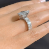 Pear Cut 3 Carat Encrusted Engagement Ring Following By Emerald Cut Eternity Band