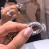 Cushion Cut 3 Carat Encrusted Engagement Ring Following By Multi Shaped Eternity Band