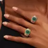 6ct Emerald Cut Emerald Halo Paved Cocktail Ring