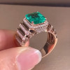 6ct Emerald Cut Emerald Halo Paved Cocktail Ring
